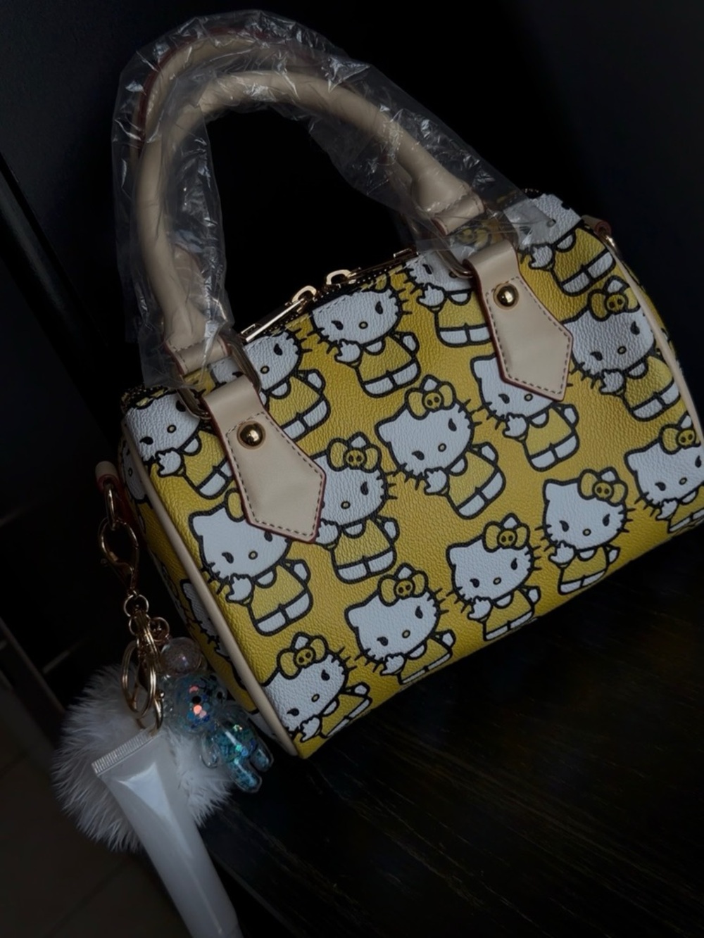 Hello Kitty Yellow Patterned Mini Top-Handle Bag with Cream Accents - Picture 2 of 3